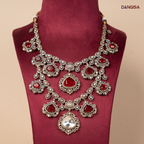 The Grand Crimson & Emerald Bib Maala