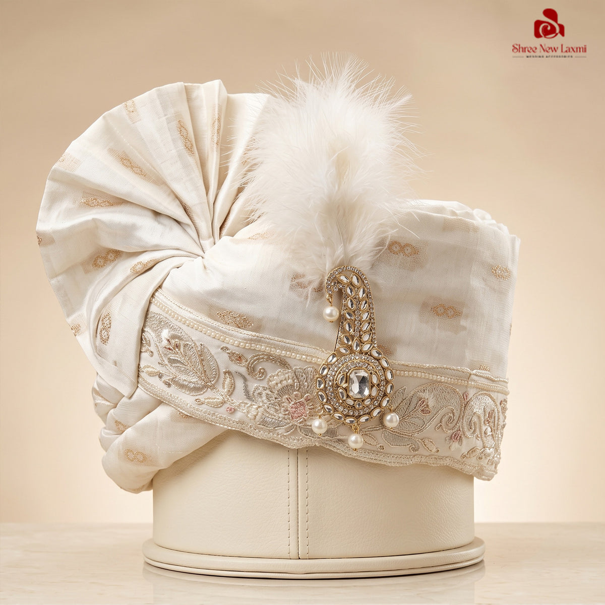 A White Safa with Hand-Embroidered Border & Diamond Brooch