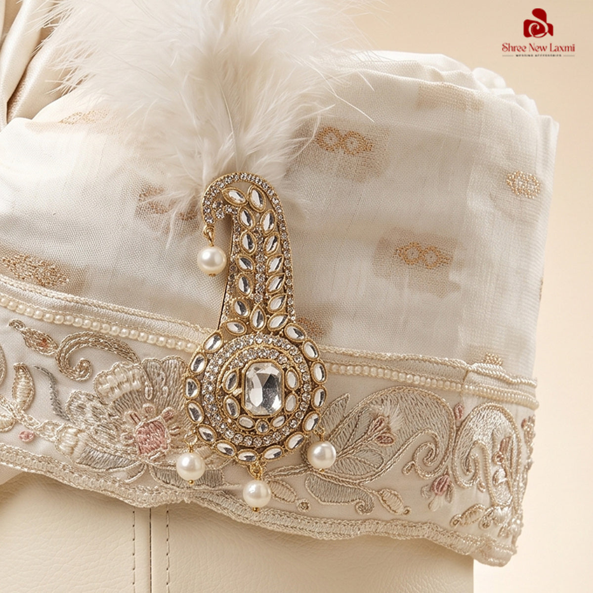 A White Safa with Hand-Embroidered Border & Diamond Brooch